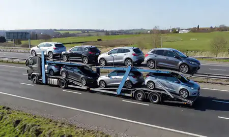 Multi-level car carrier on the motorway to Stoke-on-Trent, Staffordshire, United Kingdom