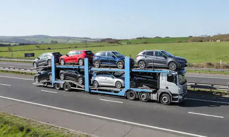 Multi-level car carrier on the motorway to Tamworth, Staffordshire, United Kingdom