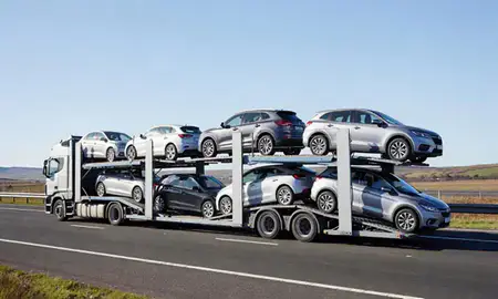 Multi-level car carrier on the motorway to Stirling, United Kingdom