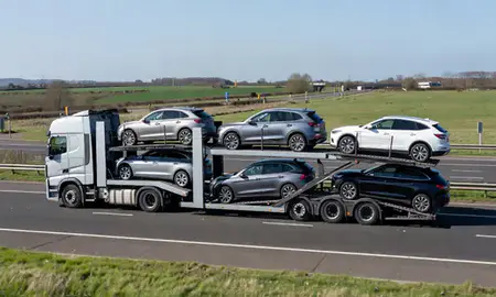 Multi-level car carrier on the motorway to Suffolk, United Kingdom
