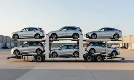 Car transporter parked in an industrial area of Surrey, United Kingdom