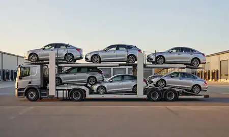 Car transporter parked in an industrial area of Camberley, Surrey, United Kingdom