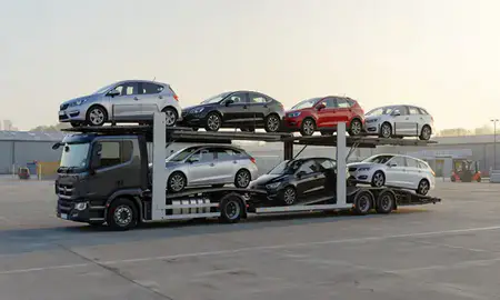Car transporter loaded with vehicles in Camberley, Surrey, United Kingdom