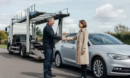 Vehicle owner beside their delivered car in Ewell, Surrey, United Kingdom