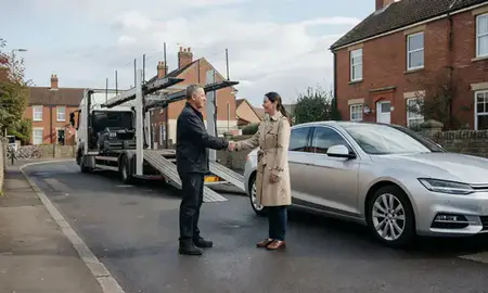 Vehicle owner beside their delivered car in Guildford, Surrey, United Kingdom