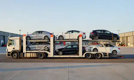 Car transporter parked in an industrial area of Guildford, Surrey, United Kingdom