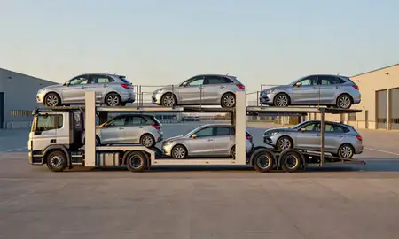 Car transporter parked in an industrial area of Redhill, Surrey, United Kingdom