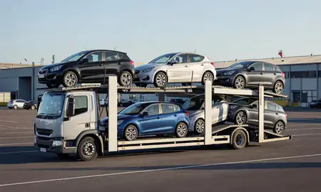 Car transporter loaded with vehicles in Redhill, Surrey, United Kingdom