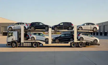 Car transporter parked in an industrial area of Walton-on-Thames, Surrey, United Kingdom