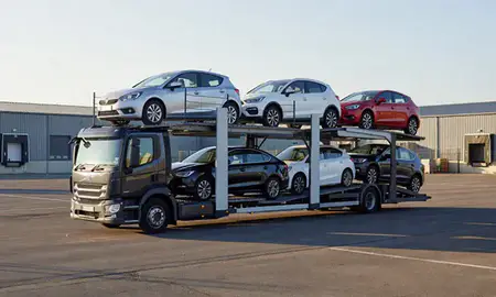 Car transporter loaded with vehicles in Walton-on-Thames, Surrey, United Kingdom