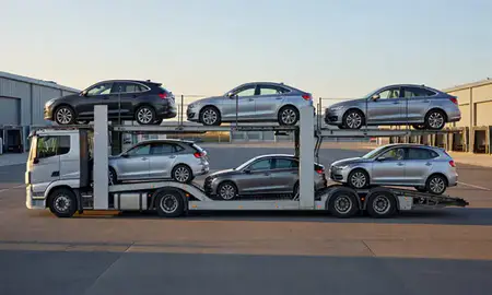 Car transporter parked in an industrial area of Gateshead, Tyne and Wear, United Kingdom