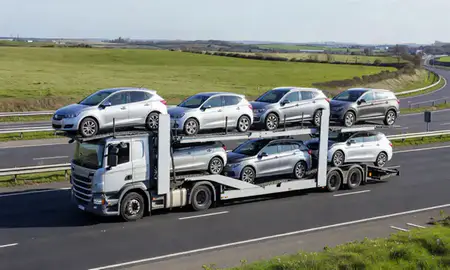 Multi-level car carrier on the motorway to Jarrow, Tyne and Wear, United Kingdom