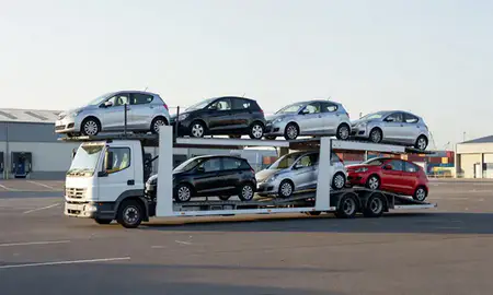 Car transporter loaded with vehicles in Longbenton, Tyne and Wear, United Kingdom