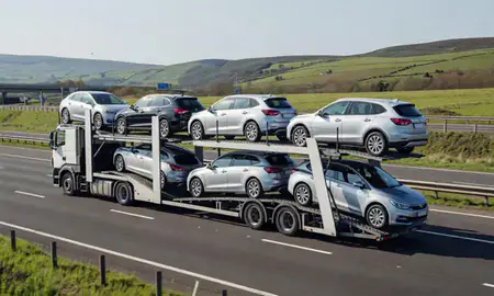 Multi-level car carrier on the motorway to Newcastle upon Tyne, Tyne and Wear, United Kingdom