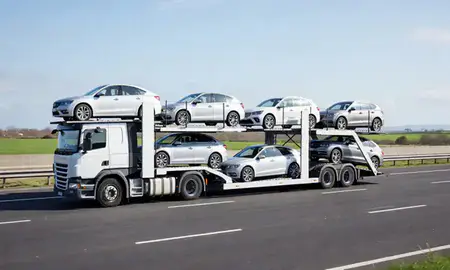 Multi-level car carrier on the motorway to Tynemouth, Tyne and Wear, United Kingdom