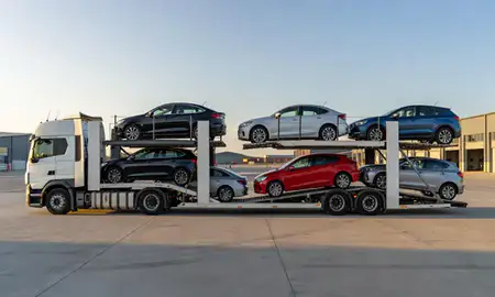 Car transporter parked in an industrial area of Wallsend, Tyne and Wear, United Kingdom