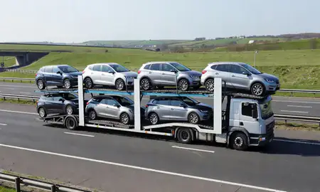 Multi-level car carrier on the motorway to Washington, Tyne and Wear, United Kingdom