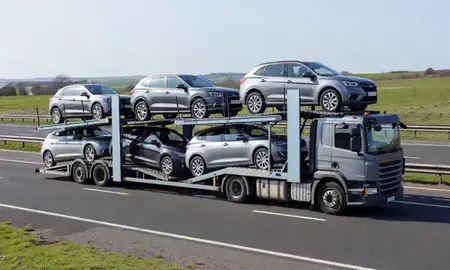 Multi-level car carrier on the motorway to Whitley Bay, Tyne and Wear, United Kingdom