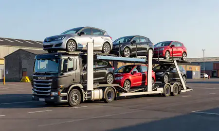 Car transporter loaded with vehicles in Royal Leamington Spa, Warwickshire, United Kingdom