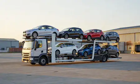 Car transporter loaded with vehicles in Rugby, Warwickshire, United Kingdom