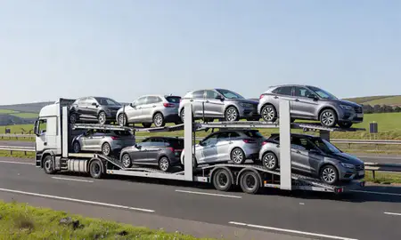 Multi-level car carrier on the motorway to West Glamorgan, United Kingdom
