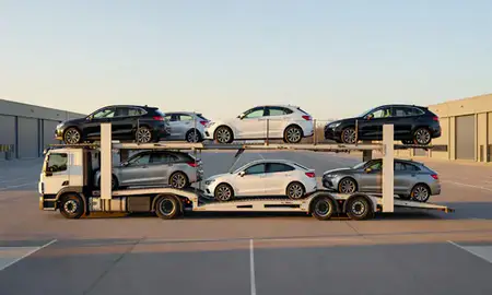 Car transporter parked in an industrial area of Neath, West Glamorgan, United Kingdom
