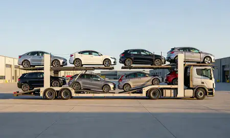 Car transporter parked in an industrial area of Port Talbot, West Glamorgan, United Kingdom
