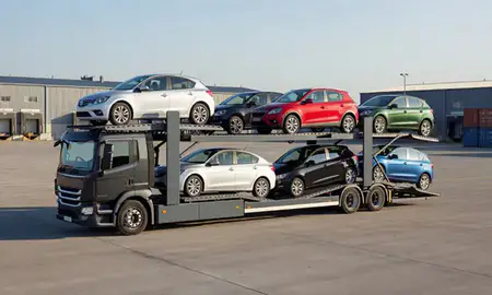 Car transporter loaded with vehicles in Port Talbot, West Glamorgan, United Kingdom