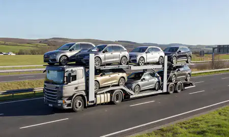 Multi-level car carrier on the motorway to Livingston, West Lothian, United Kingdom