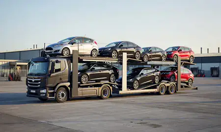 Car transporter loaded with vehicles in West Midlands, United Kingdom