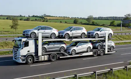 Multi-level car carrier on the motorway to Aldridge, West Midlands, United Kingdom