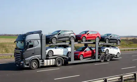 Multi-level car carrier on the motorway to Coventry, West Midlands, United Kingdom