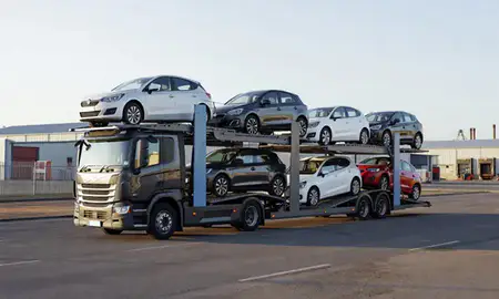Car transporter loaded with vehicles in Coventry, West Midlands, United Kingdom