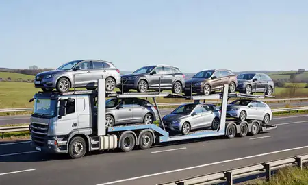 Multi-level car carrier on the motorway to Dudley, West Midlands, United Kingdom