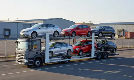 Car transporter loaded with vehicles in Dudley, West Midlands, United Kingdom
