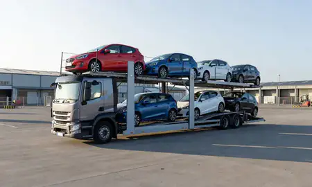 Car transporter loaded with vehicles in Halesowen, West Midlands, United Kingdom