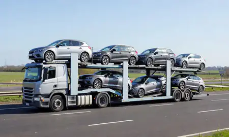 Multi-level car carrier on the motorway to Kingswinford, West Midlands, United Kingdom