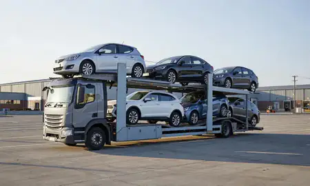 Car transporter loaded with vehicles in Smethwick, West Midlands, United Kingdom