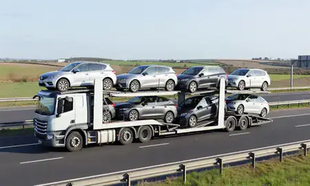 Multi-level car carrier on the motorway to Solihull, West Midlands, United Kingdom