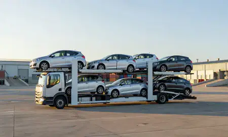 Car transporter loaded with vehicles in Solihull, West Midlands, United Kingdom