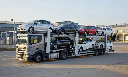 Car transporter loaded with vehicles in Sutton Coldfield, West Midlands, United Kingdom