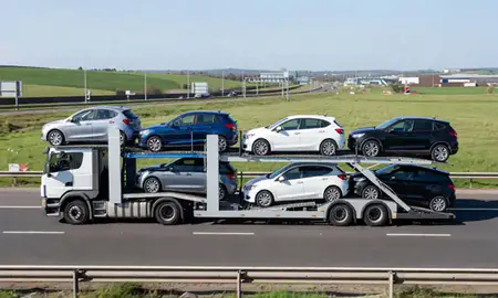 Multi-level car carrier on the motorway to West Bromwich, West Midlands, United Kingdom