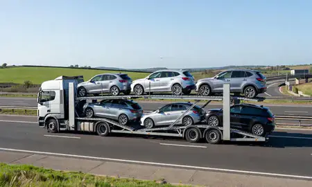 Multi-level car carrier on the motorway to West Sussex, United Kingdom