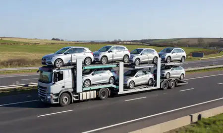 Multi-level car carrier on the motorway to Haywards Heath, West Sussex, United Kingdom