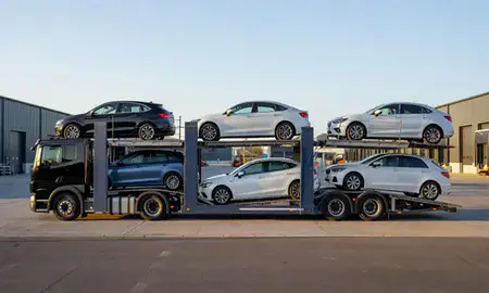 Car transporter parked in an industrial area of Haywards Heath, West Sussex, United Kingdom