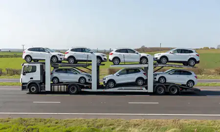 Multi-level car carrier on the motorway to Horsham, West Sussex, United Kingdom