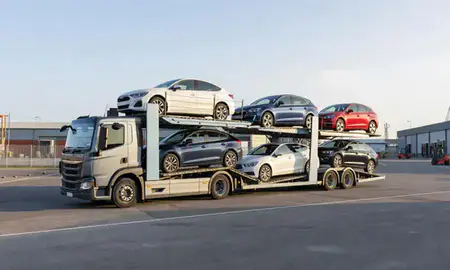 Car transporter loaded with vehicles in Horsham, West Sussex, United Kingdom