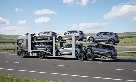 Multi-level car carrier on the motorway to West Yorkshire, United Kingdom