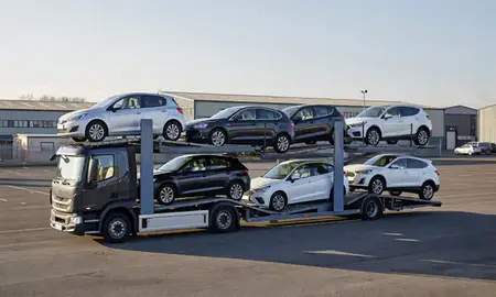 Car transporter loaded with vehicles in Batley, West Yorkshire, United Kingdom