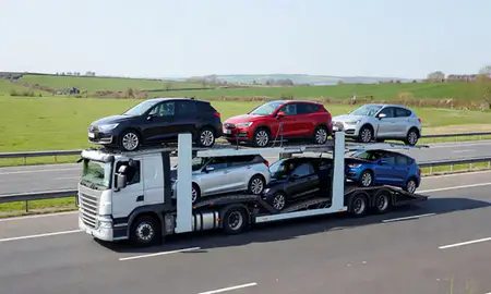 Multi-level car carrier on the motorway to Chippenham, Wiltshire, United Kingdom